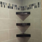 Custom Shower with Black Shelves and Border